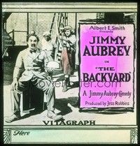 3e124 BACKYARD glass slide '20 girl shoots arrow at apple on Jimmy Aubrey's head like William Tell!
