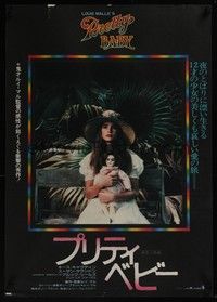 3f266 PRETTY BABY Japanese '78 directed by Louis Malle, young Brooke Shields sitting with doll!