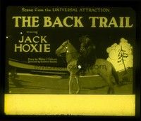 5d147 BACK TRAIL glass slide '24 Jack Hoxie & Eugenia Gilbert together on horseback!