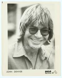 5g198 JOHN DENVER signed 8x10 publicity still '70s c/u smiling portrait with shaggy hair & shades!