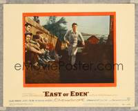 5z258 EAST OF EDEN LC '55 concerned James Dean running past sitting men, John Steinbeck, Kazan!