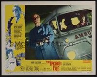 5z362 IPCRESS FILE LC #3 '65 close up of Michael Caine with machine gun by ambulance!