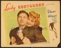 5z381 LADY BODYGUARD LC '43 close up of Anne Shirley hugging Eddie Albert while handcuffed!