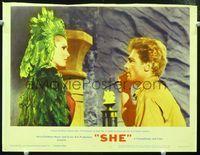 5z506 SHE LC #5 '65 Ursula Andress in wacky feathered outfit dares John Richardson to stab her!