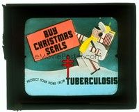 6b167 CHRISTMAS SEALS glass slide '20s buying them will protect your home from Tuberculosis!