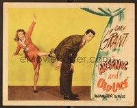 6d147 ARSENIC & OLD LACE LC '44 close up of Priscilla Lane kicking Cary Grant, Frank Capra classic