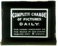 6e119 COMPLETE CHANGE OF PICTURES DAILY glass slide '20s cool ad for candy machines on chairs!