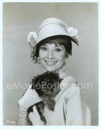 6k010 MY FAIR LADY 7.5x9.5 still '64 smiling portrait of Audrey Hepburn holding her little dog!