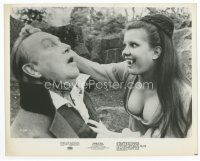7b533 TWINS OF EVIL 8x10 still '72 close up of one of the vampire sisters about to feed on victim!