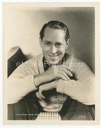 7c053 FRANCHOT TONE signed 8x10 still '40s smoking portrait with his elbows on his knees!