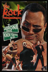 7j135 ROCK signed commercial poster '00 lots of great images of the wrestling star!