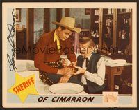 7j072 SHERIFF OF CIMARRON signed LC '45 by Sunset Carson, who's getting his bad arm bandaged!