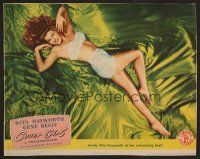 7s331 COVER GIRL LC '44 sexiest full-length Rita Hayworth laying down with flowing red hair!