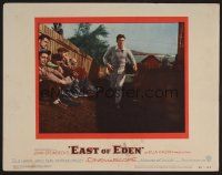 7s373 EAST OF EDEN LC #1 '55 concerned James Dean running past sitting men, John Steinbeck, Kazan!