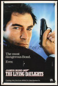 8k347 LIVING DAYLIGHTS teaser 1sh '87 super close up of Timothy Dalton as James Bond with gun!