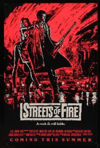 8k571 STREETS OF FIRE advance 1sh '84 Walter Hill, pink art of Michael Pare & Diane Lane!