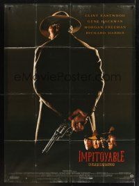 8p465 UNFORGIVEN French 1p '92 classic image of gunslinger Clint Eastwood with his back turned!