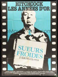 8p468 VERTIGO French 1p R83 great full-length image of Alfred Hitchcock holding clapboard!