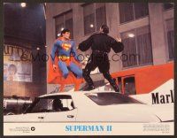8t693 SUPERMAN II color 11x14 still '81 Christopher Reeve in costume fighting Terence Stamp on car!