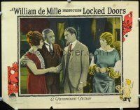 8t458 LOCKED DOORS LC '25 Theodore Roberts introduces Betty Compson to young man!