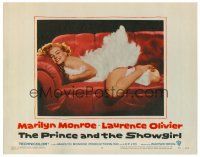 8t565 PRINCE & THE SHOWGIRL LC #6 '57 sexiest Marilyn Monroe smiling on red couch in feathers!