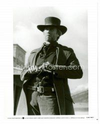 8w535 PALE RIDER 8x10 still '85 vertical portrait of cowboy Clint Eastwood holding revolver!