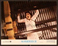 9b698 SUPERMAN II 11x14 still #3 '81 close up of Margot Kidder as Lois Lane hanging from metal bar!