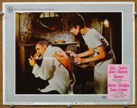9b213 CHARADE LC #8 R68 Audrey Hepburn puts alcohol on Cary Grant's cut up back!