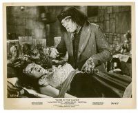 9j077 BLOOD OF THE VAMPIRE 8x10 still '58 c/u of deformed man leaning over beautiful girl on table!