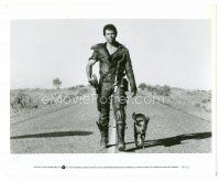 9j430 MAD MAX 2: THE ROAD WARRIOR 8x10 still '82 classic image of Mel Gibson walking with his dog!