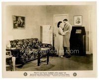 9j476 MURDER WITH MUSIC 8x10 still '41 black couple embracing in cool 1940s apartment!