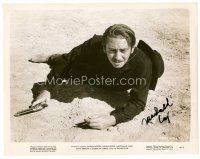 9w159 MACDONALD CAREY signed 8x10 still '49 on the ground with gun drawn from Streets of Laredo!