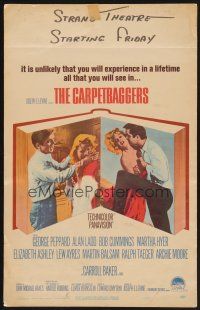 1b451 CARPETBAGGERS WC '64 great close up of Carroll Baker biting George Peppard's hand!