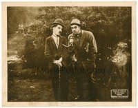 1x612 IN THE PARK LC R17 Tramp Charlie Chaplin watches scary guy eating his sausages!