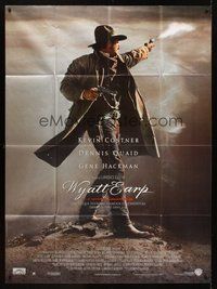 1z377 WYATT EARP French 1p '94 full-length image of cowboy Kevin Costner shooting gun!