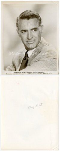 2a097 CARY GRANT 8x10.25 still '58 head & shoulders portrait of the leading man wearing suit & tie!