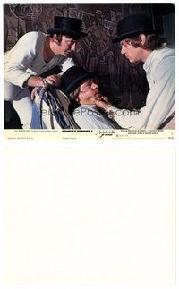 2a129 CLOCKWORK ORANGE color 8x10 still #3 '72 Malcolm McDowell mistreating his gang member!