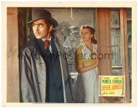 2j425 JESSE JAMES LC R46 Nancy Kelly stands behind Tyrone Power wearing hat & trench coat!