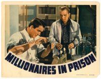 2j536 MILLIONAIRES IN PRISON LC '40 Lee Tracy watches Truman Bradley mix something up in laboratory!