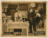 2j613 PAWNSHOP LC R22 Edna Purviance stares at Charlie Chaplin balancing doughnuts in kitchen!