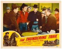 2j833 THUNDERING TRAIL LC #7 '51 many cowboys gathered around man with arm in a sling!