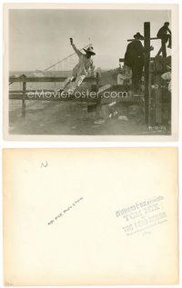 2k647 ROAD DEMON 8x10 still '21 car racer Tom Mix in cowboy hat vaulting over a wooden fence!