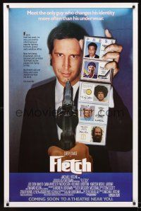 2z279 FLETCH advance 1sh '85 Michael Ritchie, wacky detective Chevy Chase has gun pulled on him!