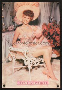 3c431 RITA HAYWORTH special 11x16 '80s great seated image of starlet in sexy costume!