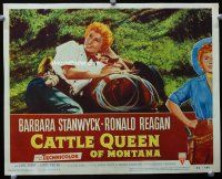 3h238 CATTLE QUEEN OF MONTANA LC #7 '54 close up of Barbara Stanwyck laying on saddle on ground!