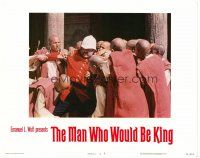 3h556 MAN WHO WOULD BE KING LC #4 '75 Sean Connery in uniform is grabbed by many monks!