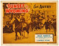 3h089 SUNSET IN WYOMING TC '41 Gene Autry & Smiley Burnette on horseback leading parade!