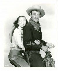 3k631 TALL IN THE SADDLE 8x10 still '44 great image of John Wayne & pretty Ella Raines on saddle!