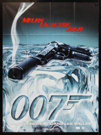 3m354 DIE ANOTHER DAY teaser French 1p '02 James Bond, cool image of smoking gun melting ice!