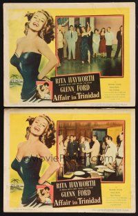3p581 AFFAIR IN TRINIDAD 2 LCs '52 cool image of sexiest Rita Hayworth dancing for Glenn Ford!